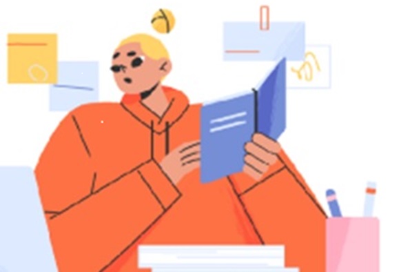 Person reviewing a book